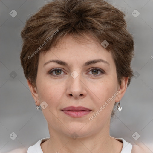 Joyful white adult female with short  brown hair and grey eyes