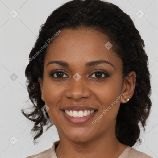 Joyful black young-adult female with medium  brown hair and brown eyes