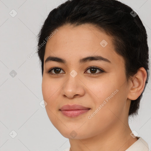 Joyful latino young-adult female with short  brown hair and brown eyes
