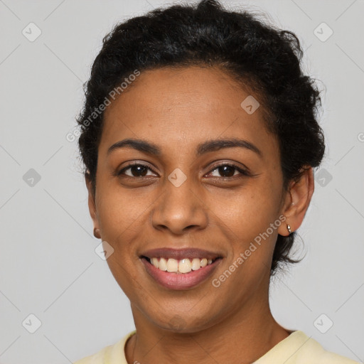 Joyful latino young-adult female with short  brown hair and brown eyes