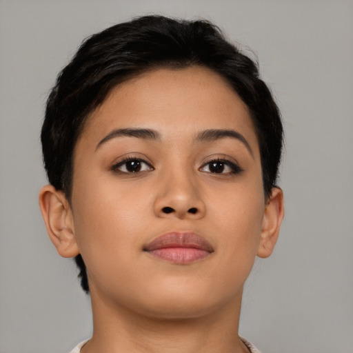 Joyful asian young-adult female with short  brown hair and brown eyes