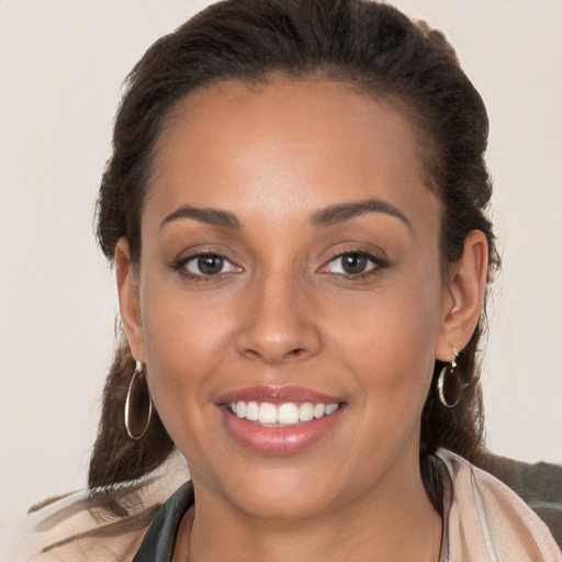 Joyful white young-adult female with long  brown hair and brown eyes