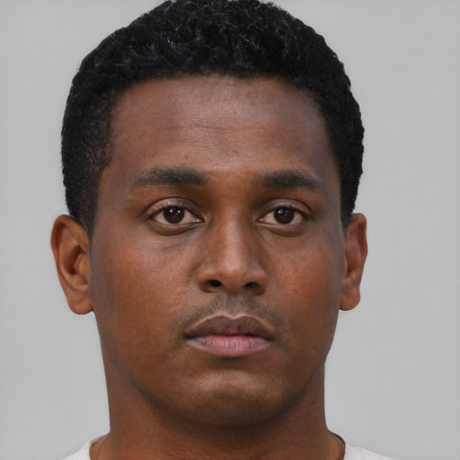 Neutral black young-adult male with short  brown hair and brown eyes