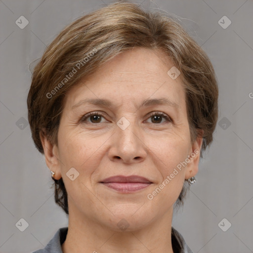 Joyful white adult female with medium  brown hair and grey eyes