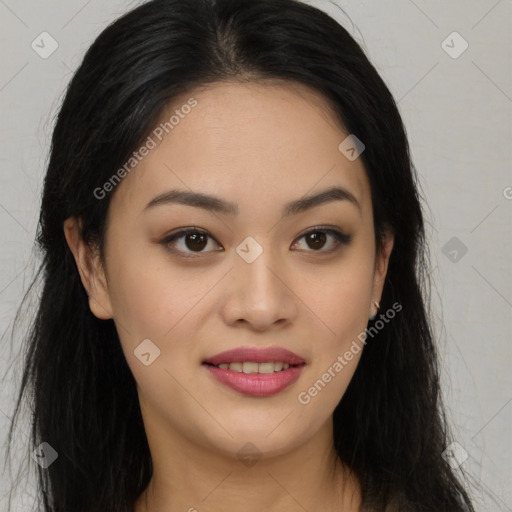 Joyful asian young-adult female with long  brown hair and brown eyes