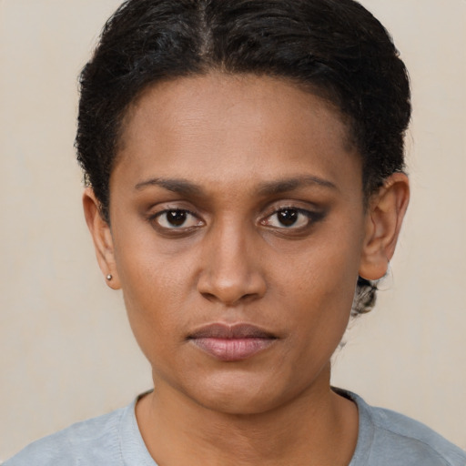 Neutral black young-adult female with short  brown hair and brown eyes