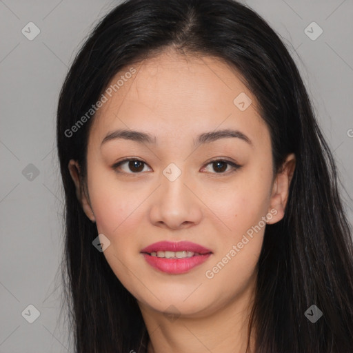 Joyful asian young-adult female with long  black hair and brown eyes