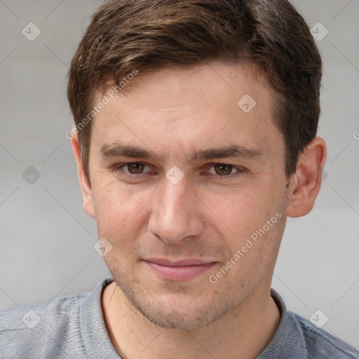 Joyful white adult male with short  brown hair and grey eyes