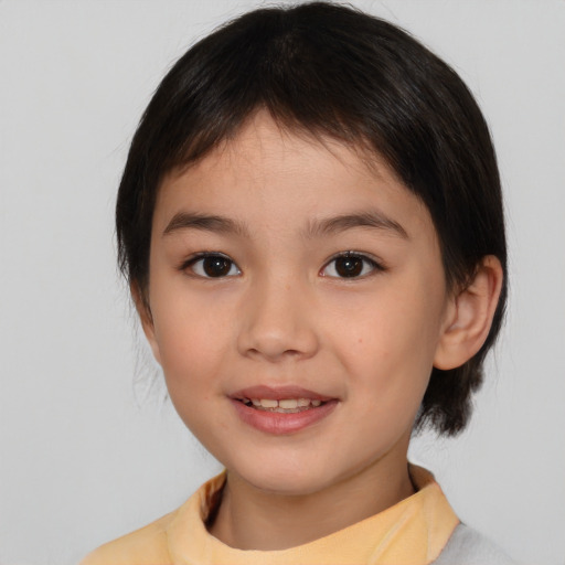 Joyful asian child female with medium  brown hair and brown eyes