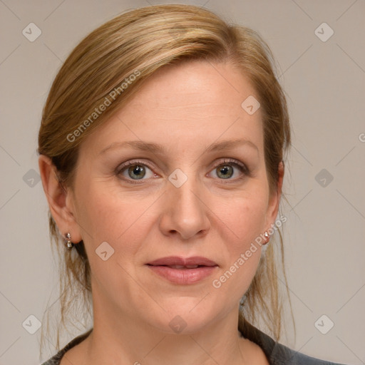 Joyful white young-adult female with medium  brown hair and blue eyes