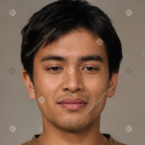 Joyful asian young-adult male with short  black hair and brown eyes