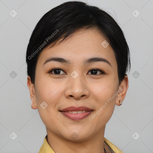 Joyful asian young-adult female with short  black hair and brown eyes