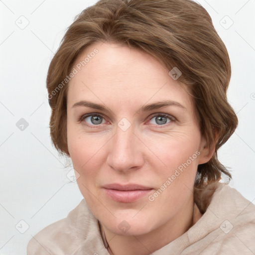 Joyful white young-adult female with medium  brown hair and blue eyes