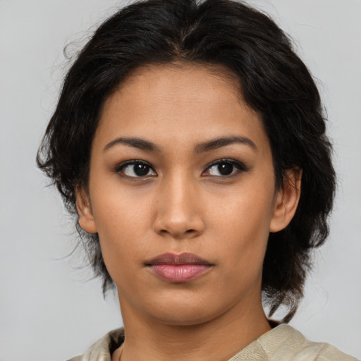 Neutral asian young-adult female with medium  brown hair and brown eyes