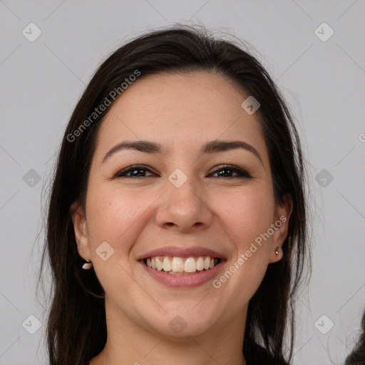 Joyful white young-adult female with long  brown hair and brown eyes