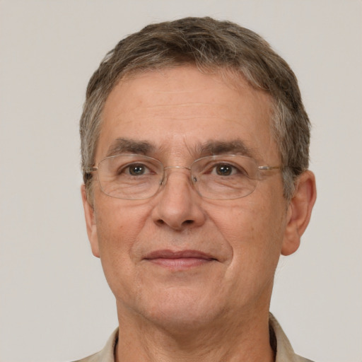 Joyful white middle-aged male with short  brown hair and brown eyes