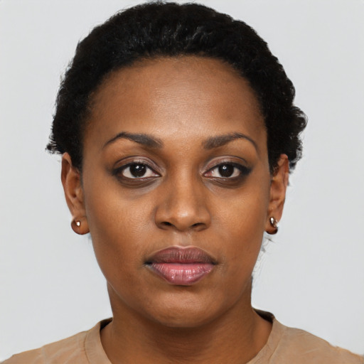 Neutral black young-adult female with short  black hair and brown eyes