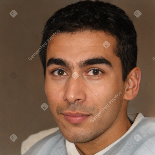 Joyful white young-adult male with short  black hair and brown eyes