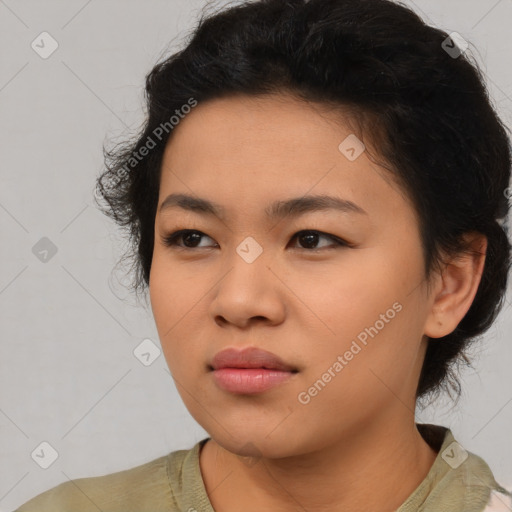 Neutral asian young-adult female with medium  brown hair and brown eyes