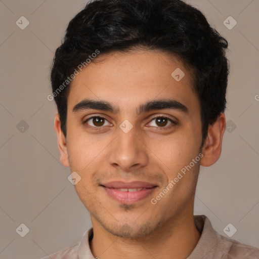 Joyful latino young-adult male with short  brown hair and brown eyes