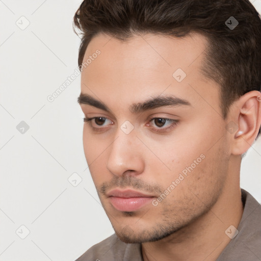 Neutral white young-adult male with short  brown hair and brown eyes