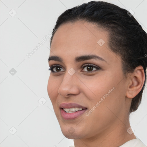 Joyful white young-adult female with short  brown hair and brown eyes