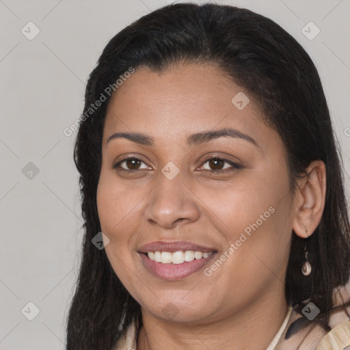 Joyful latino young-adult female with long  brown hair and brown eyes