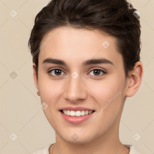 Joyful white young-adult female with short  brown hair and brown eyes