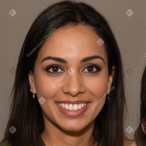 Joyful latino young-adult female with long  brown hair and brown eyes