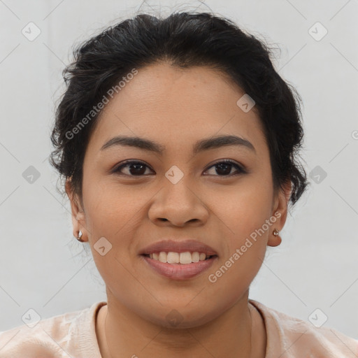 Joyful latino young-adult female with short  brown hair and brown eyes