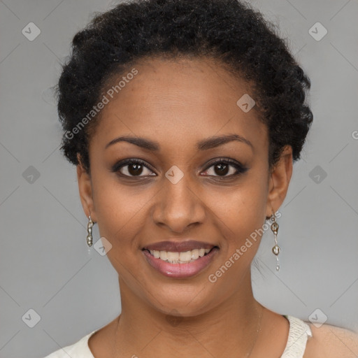 Joyful black young-adult female with short  black hair and brown eyes