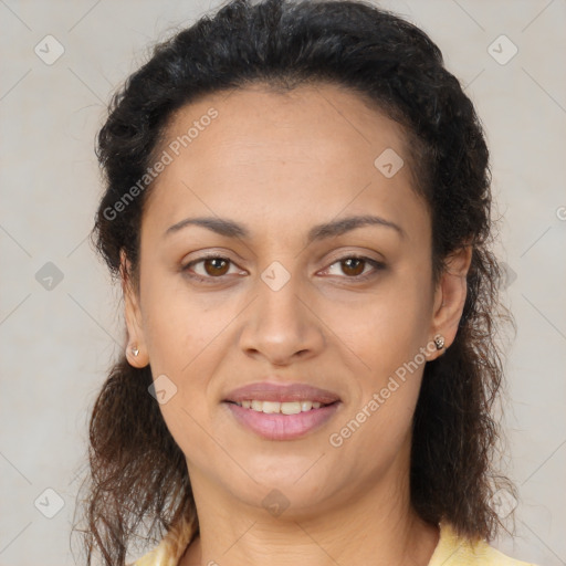 Joyful latino young-adult female with long  brown hair and brown eyes