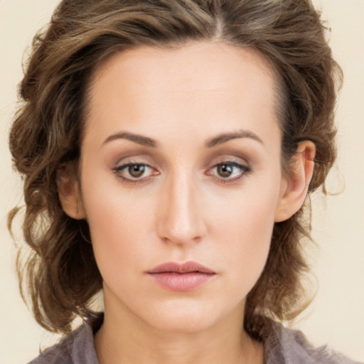 Neutral white young-adult female with medium  brown hair and green eyes