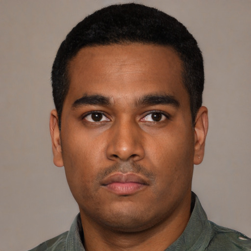 Neutral black young-adult male with short  black hair and brown eyes