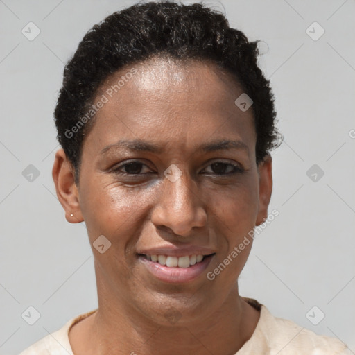 Joyful black adult female with short  brown hair and brown eyes