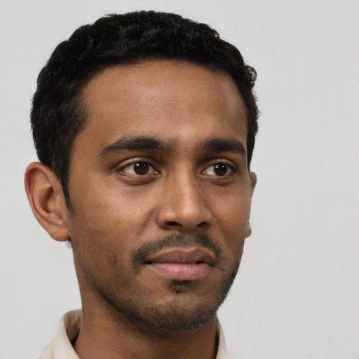 Neutral black young-adult male with short  black hair and brown eyes