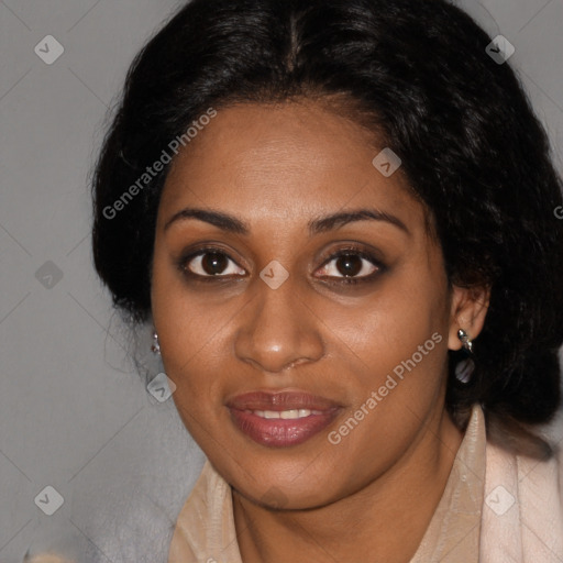 Joyful black young-adult female with medium  brown hair and brown eyes
