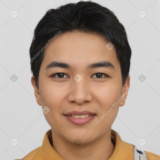 Joyful asian young-adult male with short  black hair and brown eyes