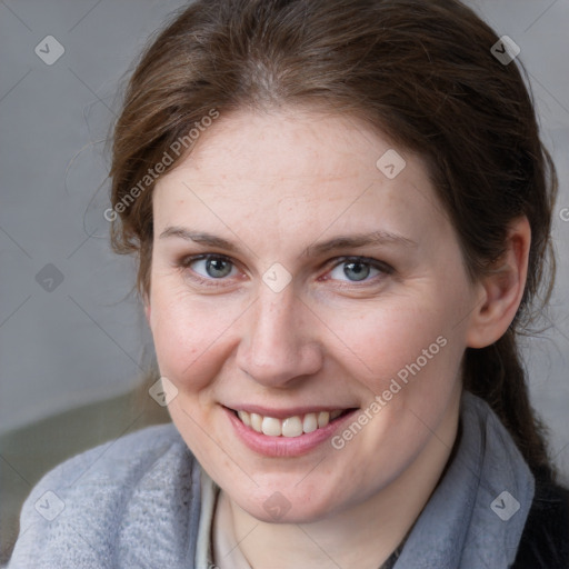 Joyful white young-adult female with medium  brown hair and blue eyes