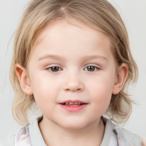 Joyful white child female with medium  brown hair and blue eyes