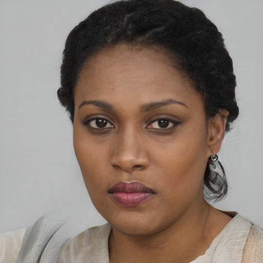 Neutral black young-adult female with medium  black hair and brown eyes