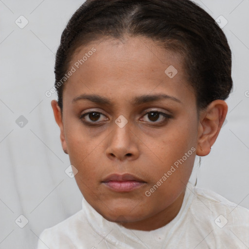 Neutral black young-adult female with short  brown hair and brown eyes