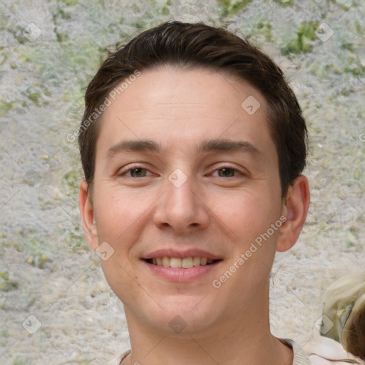 Joyful white young-adult male with short  brown hair and brown eyes