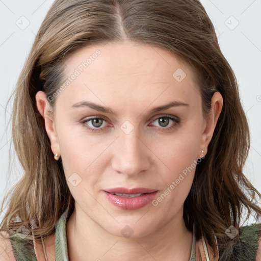 Joyful white young-adult female with long  brown hair and grey eyes