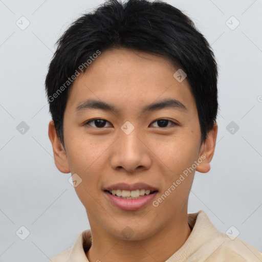 Joyful asian young-adult male with short  black hair and brown eyes