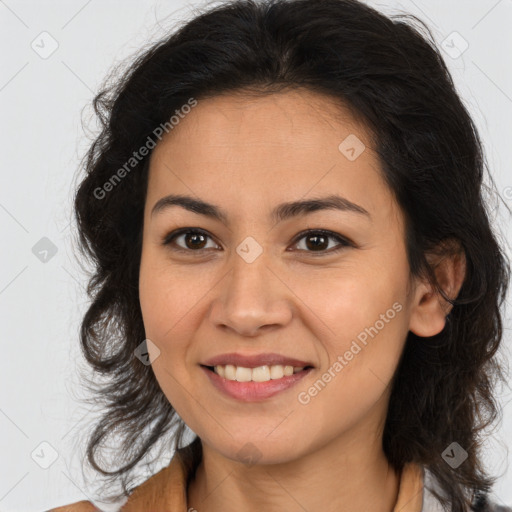 Joyful latino young-adult female with medium  brown hair and brown eyes