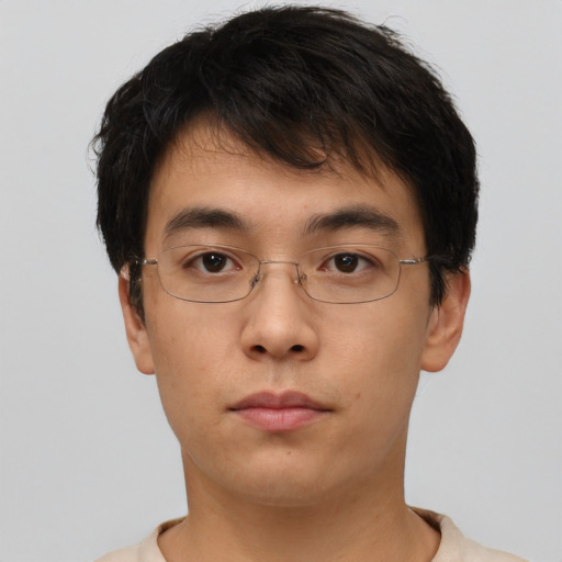 Neutral asian young-adult male with short  brown hair and brown eyes