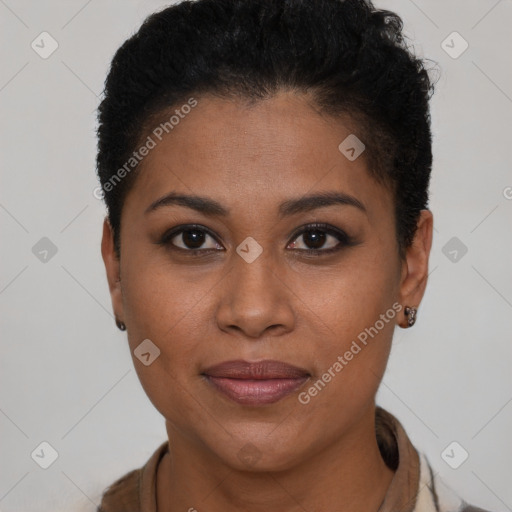 Joyful black young-adult female with short  brown hair and brown eyes