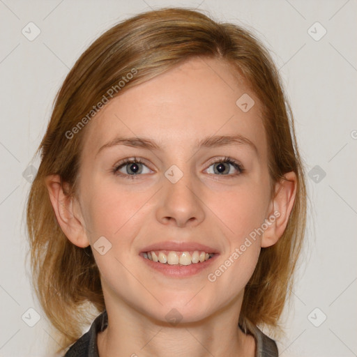 Joyful white young-adult female with medium  brown hair and blue eyes