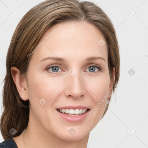 Joyful white young-adult female with medium  brown hair and blue eyes